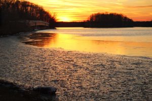 An Icy Sunset Scene in Winter of Loch Raven Reservior and the Bridge over Loch Raven Drive